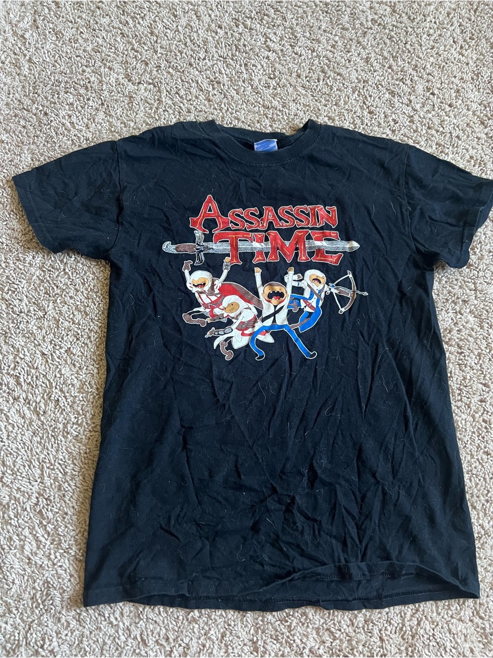 Assassin Creed x Adventure Time Graphic Tee in Black with Red and Blue Print